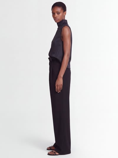 Khaite: Kira virgin wool draped-waist trousers