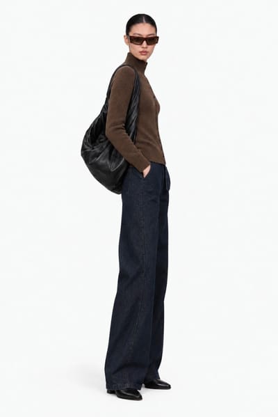 Lemaire: Twisted denim trousers with leather belt