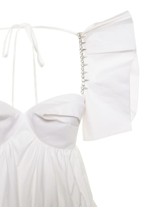 Area: Robe en coton avec manches bouffantes