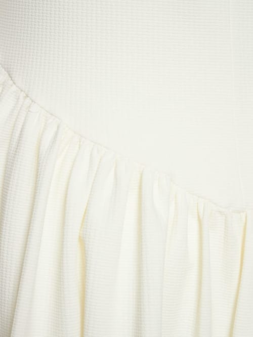 Marysia: Vestido corto acampanado elástico