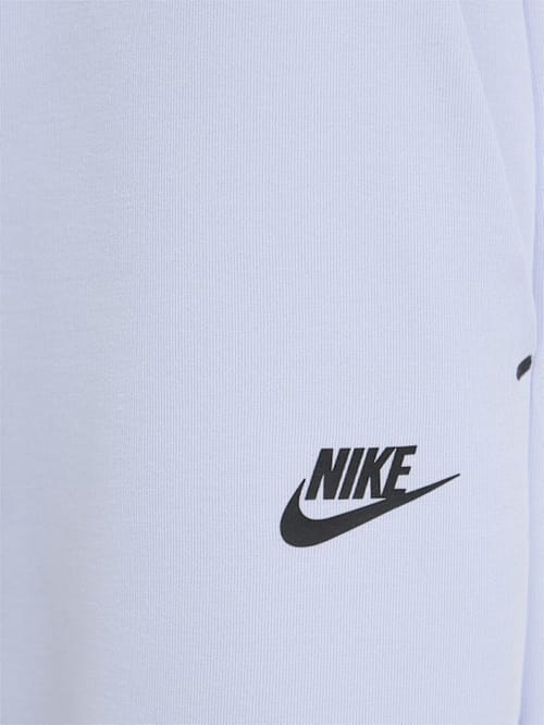 Nike: 带口袋的锥形裤