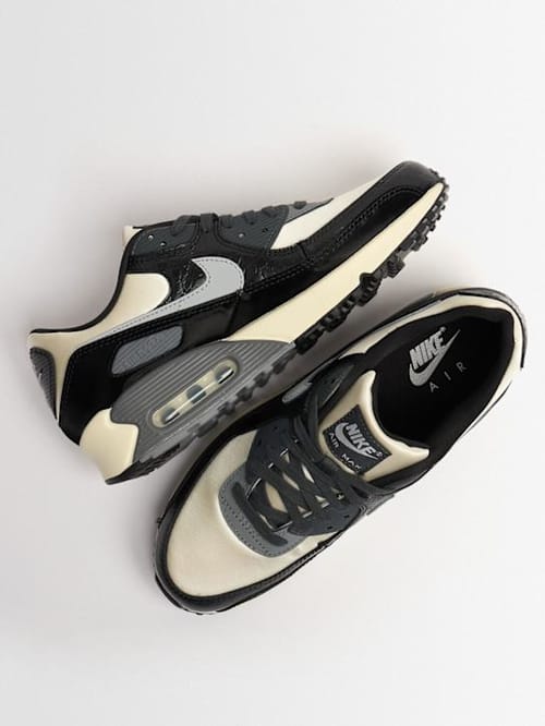 Nike: Low-top sneakers with overlapping details