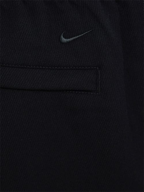 Nike: 宽腿裤，带前扣