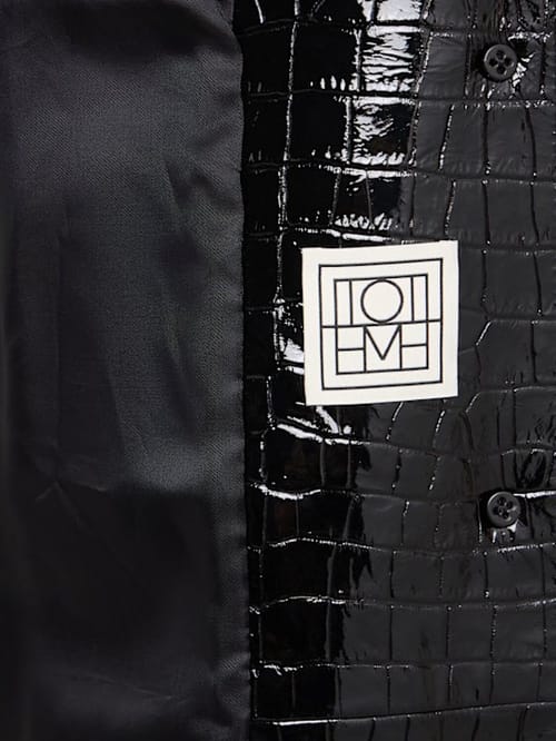 Toteme: 前扣宽松大衣