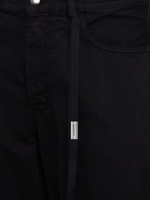 Ann Demeulemeester: 宽腿牛仔裤，带扣闭合