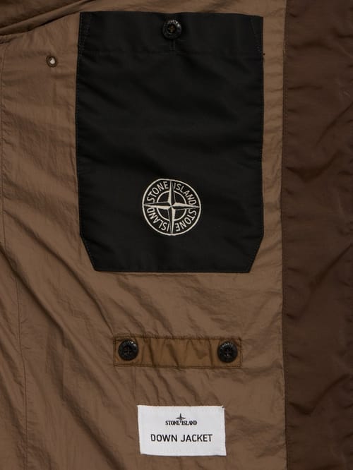 Stone Island: Nylon hooded down jacket
