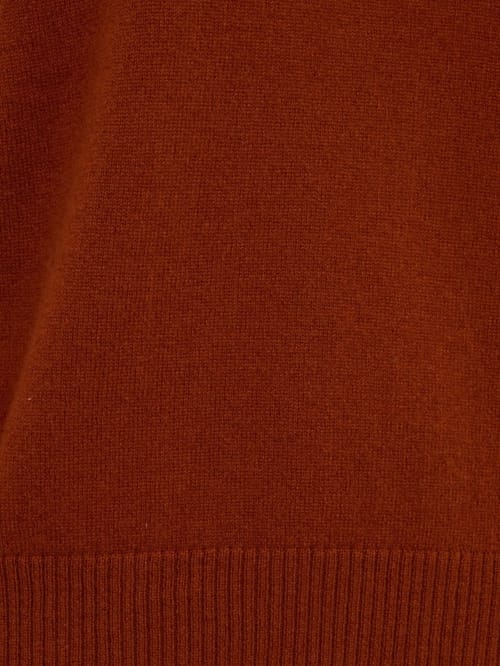 CRUNA: Pull oversize à col en V