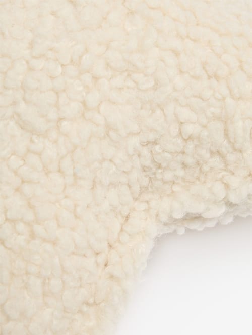WIGIWAMA: Cuscino a stella effetto teddy
