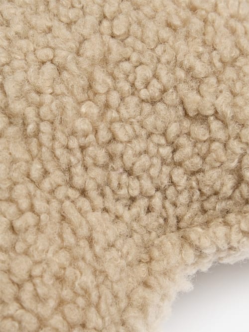 WIGIWAMA: Cuscino a stella effetto teddy