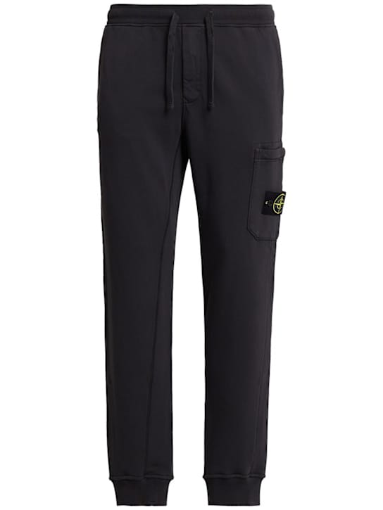 Stone Island: 有口袋的锥形裤子