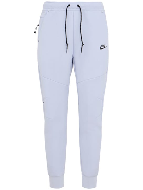 Nike: 带口袋的锥形裤