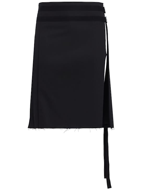 Ann Demeulemeester: 带腰带的包裹裙