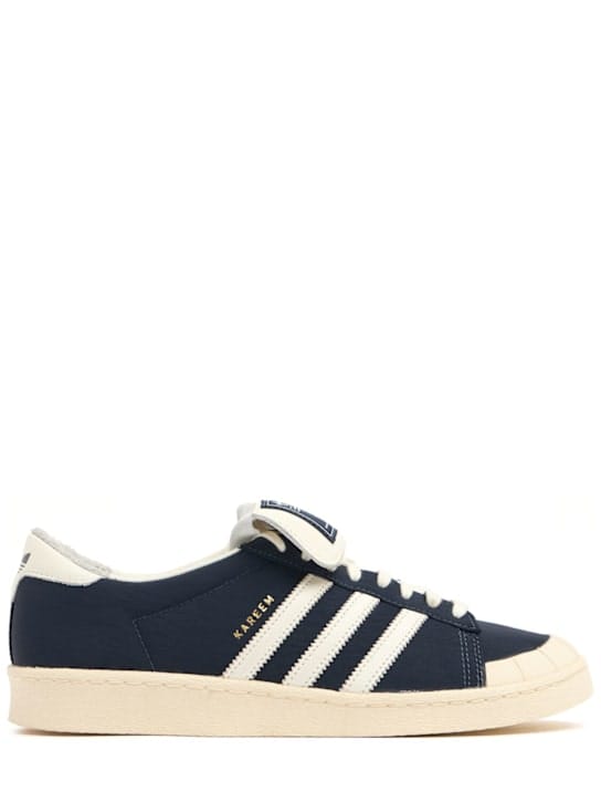adidas Originals: Low-top sneakers with visible tongue