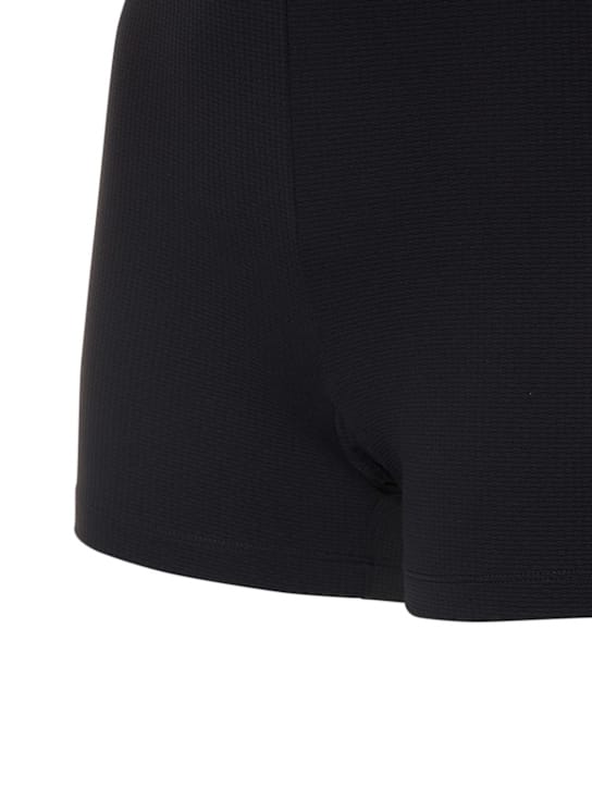 Marysia: Flared stretch-jersey mini dress