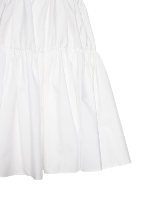 Area: Robe en coton avec manches bouffantes