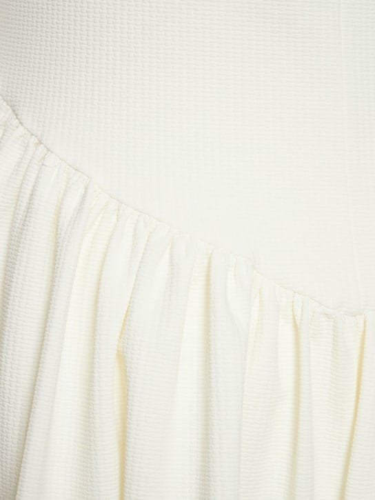 Marysia: Vestido corto acampanado elástico