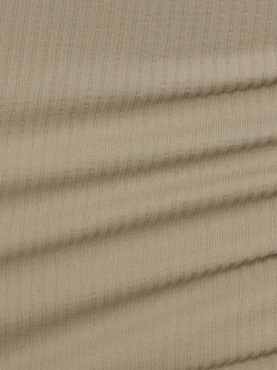 Andreadamo: Ribbed knit cut-out mini dress