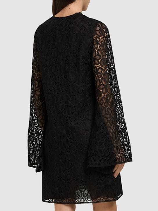 Giambattista Valli: Lace mini dress with flared sleeves