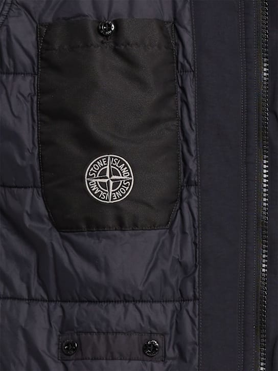 Stone Island: Parka in nylon con cappuccio