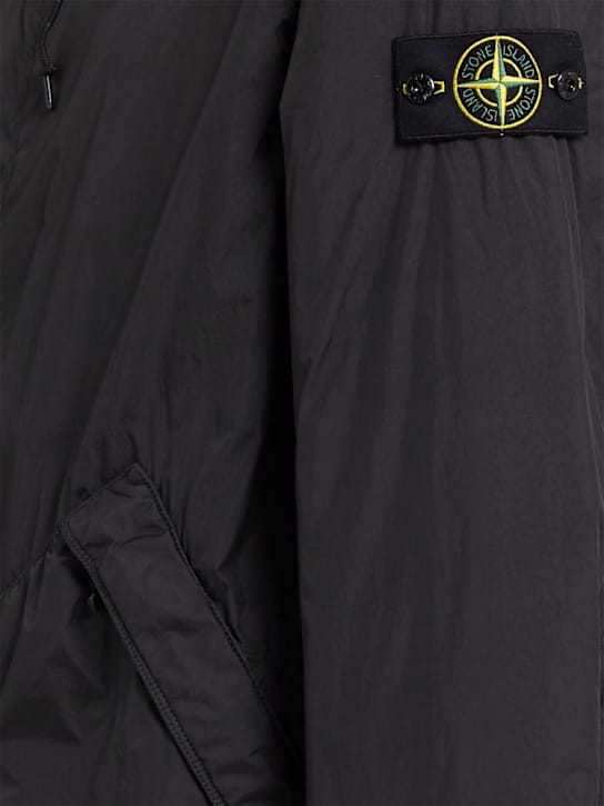 Stone Island: Parka in nylon con cappuccio