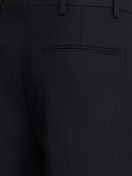Dries Van Noten: 宽腿褶皱裤