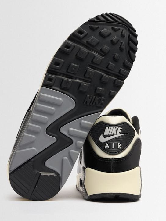Nike: Low-top sneakers with overlapping details