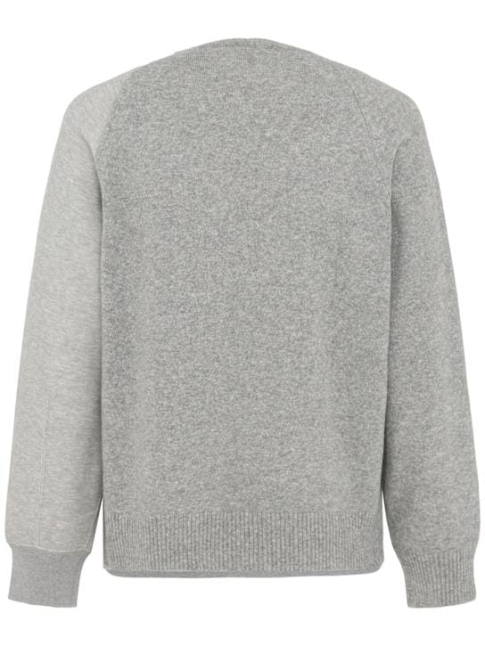 Sacai: 夹克领配对比袖子的卫衣