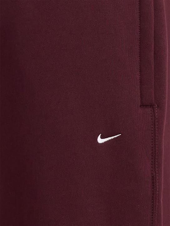 Nike: 弹性宽腿裤