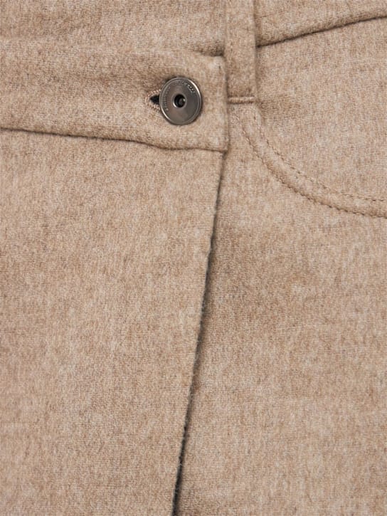 Brunello Cucinelli: 扣子包裹裙