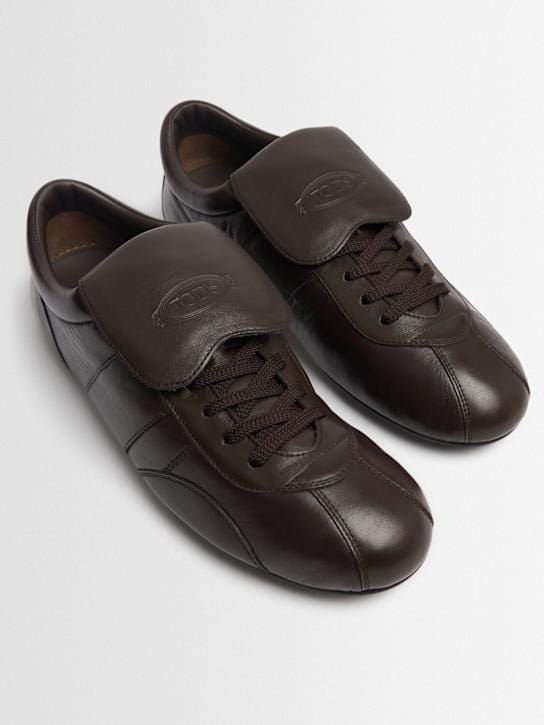 Tod's: 低筒运动鞋，带可见鞋舌