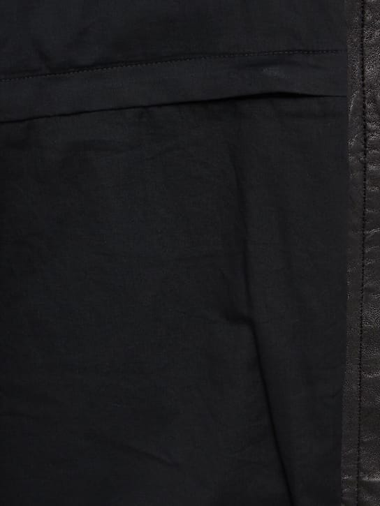 Ann Demeulemeester: 短款外套，配有扣子闭合
