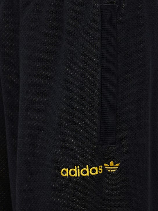 adidas Originals - 宽腿裤，配有图形细节