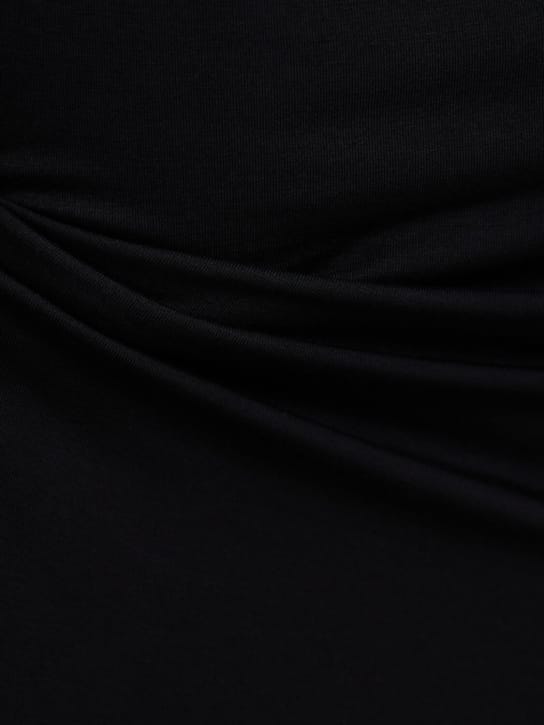 DIANA MILKANOVA: Long jersey dress with open back