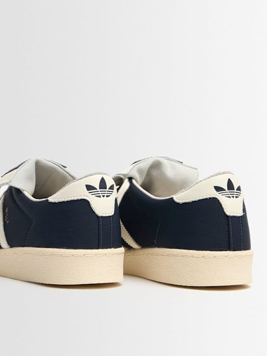 adidas Originals: Low-top sneakers with visible tongue