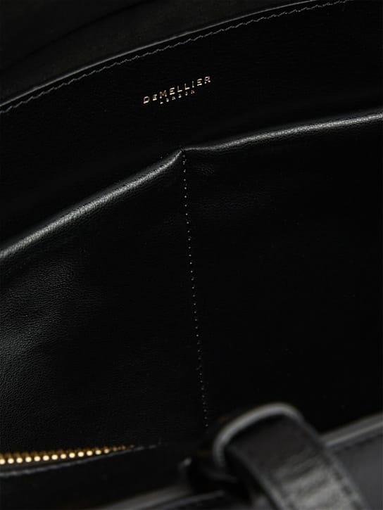 DeMellier: 带双把手和结构化轮廓的托特包