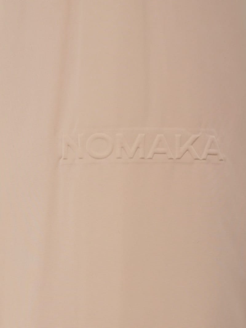 NOMAKA: Vial light puffer men