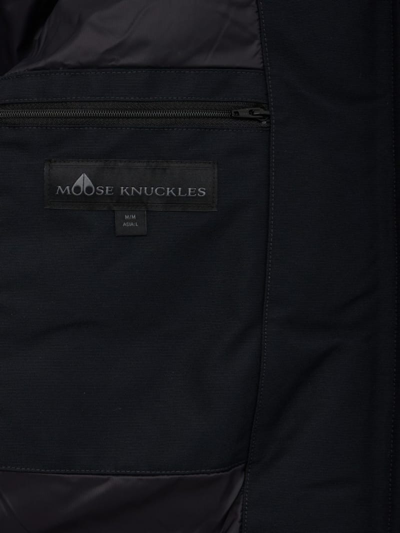 Moose Knuckles: Ballistic cotton down bomber w/ fur trim