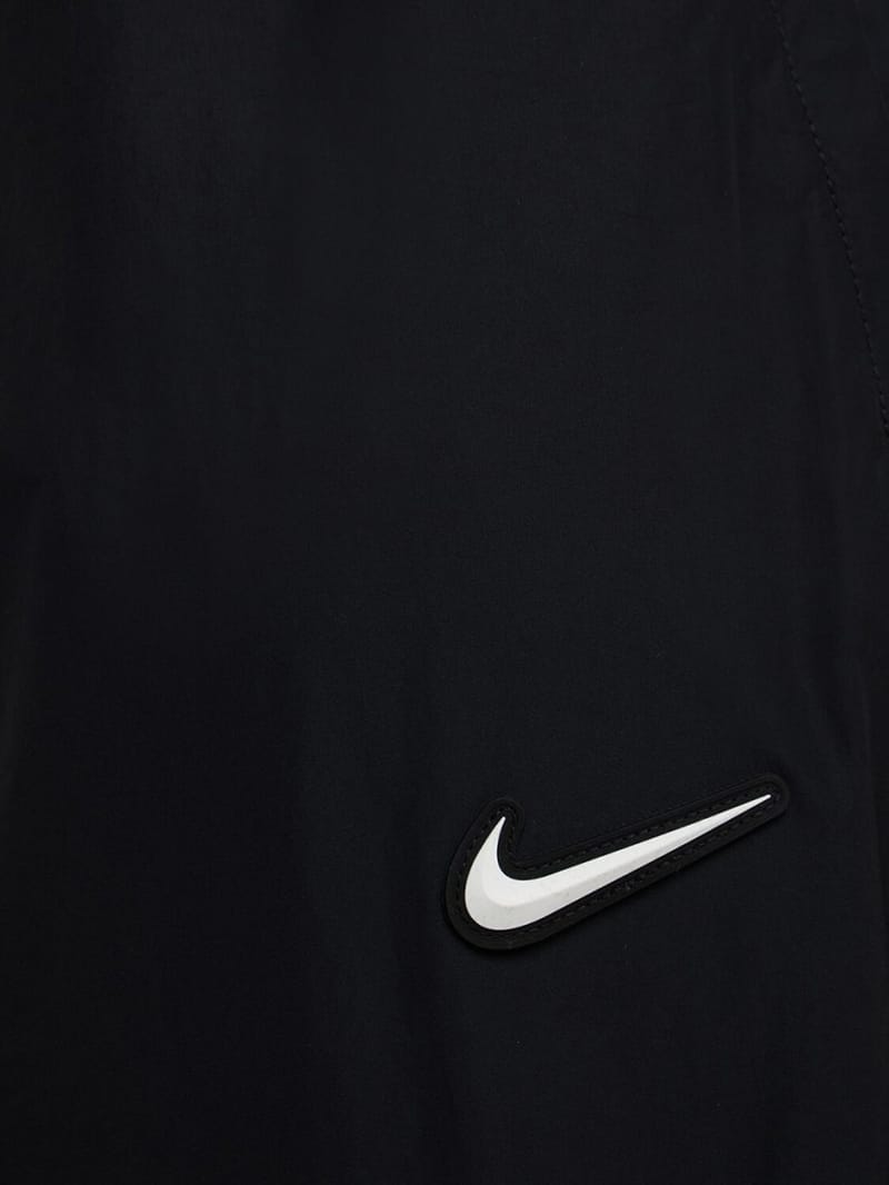 Nike: 带弹性的修身裤
