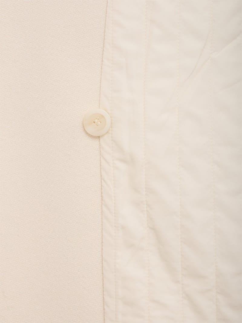 CRUNA: Oversize Doppelbreasted langer Mantel