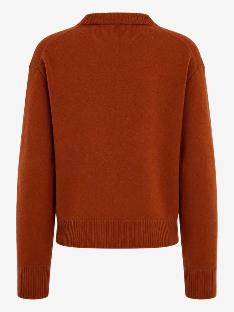 CRUNA: Pull oversize à col en V