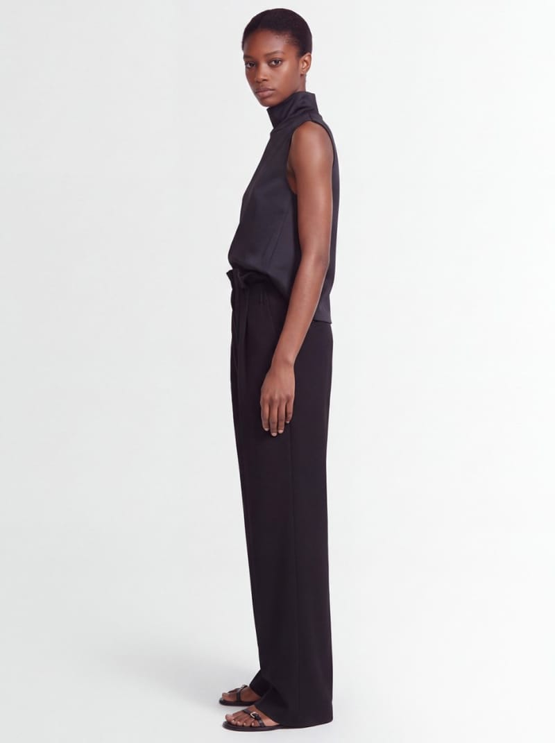 Khaite: Kira virgin wool draped-waist trousers