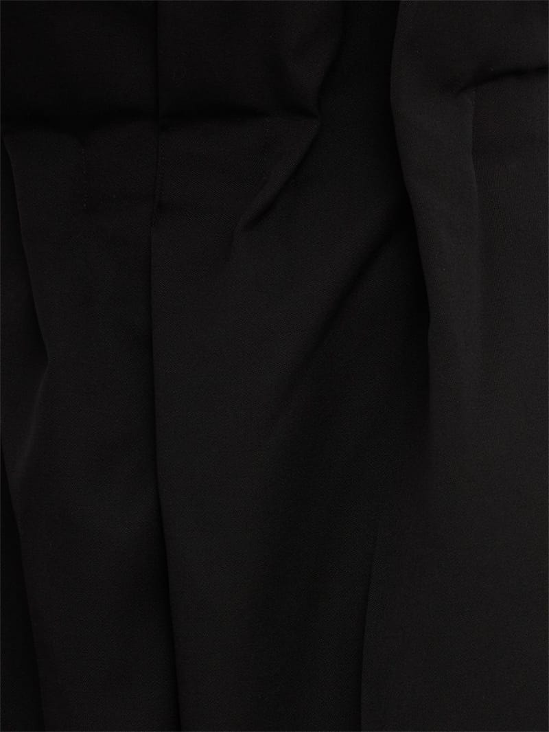 Khaite: Kira virgin wool draped-waist trousers