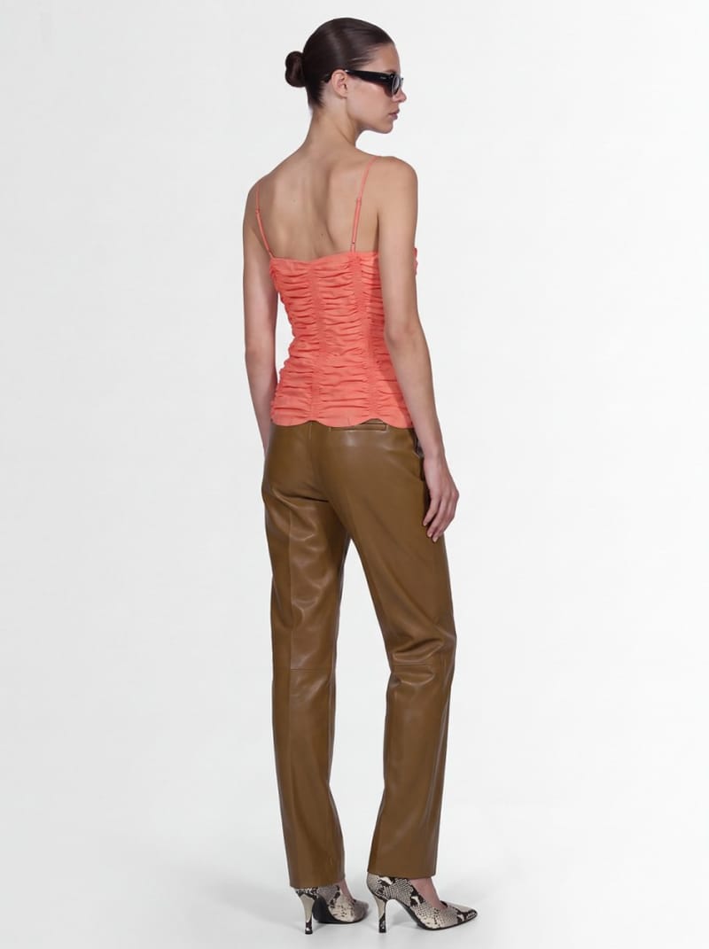Khaite: Mita lambskin pleated trousers
