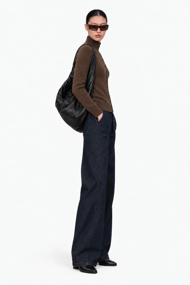 Lemaire: Twisted denim trousers with leather belt
