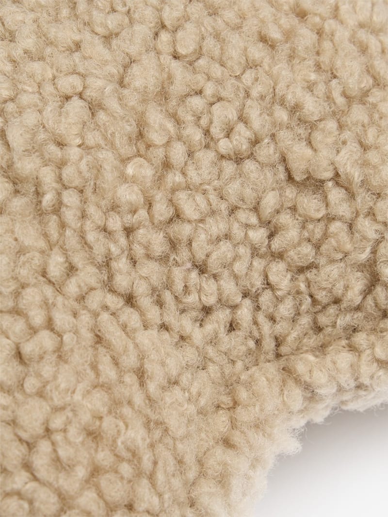 WIGIWAMA: Cuscino a stella effetto teddy