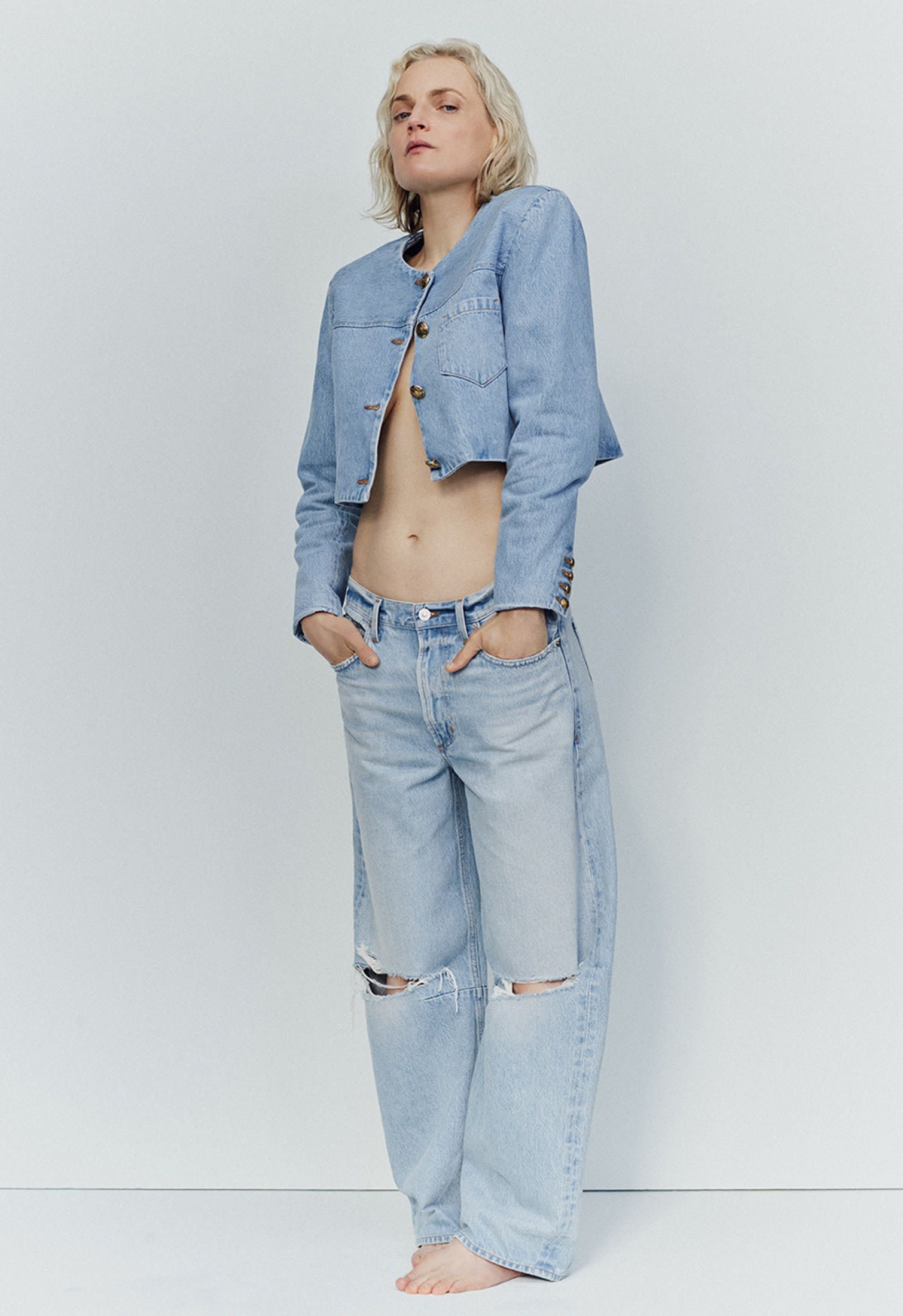 Light blue washed baggy jeans with cut-outs