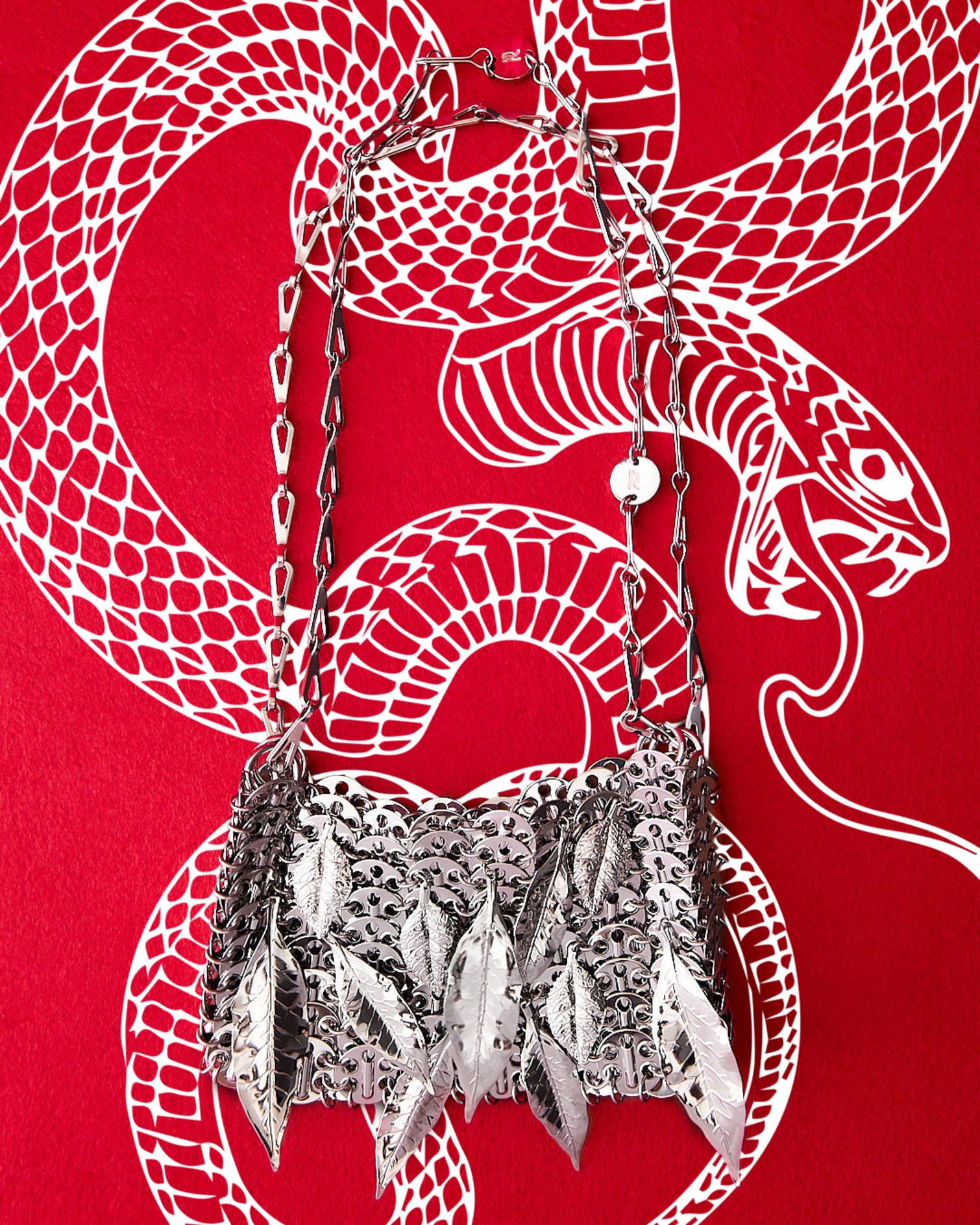 Rabanne Nano 1969 embroidered shoulder bag. White snake motif on a red background.