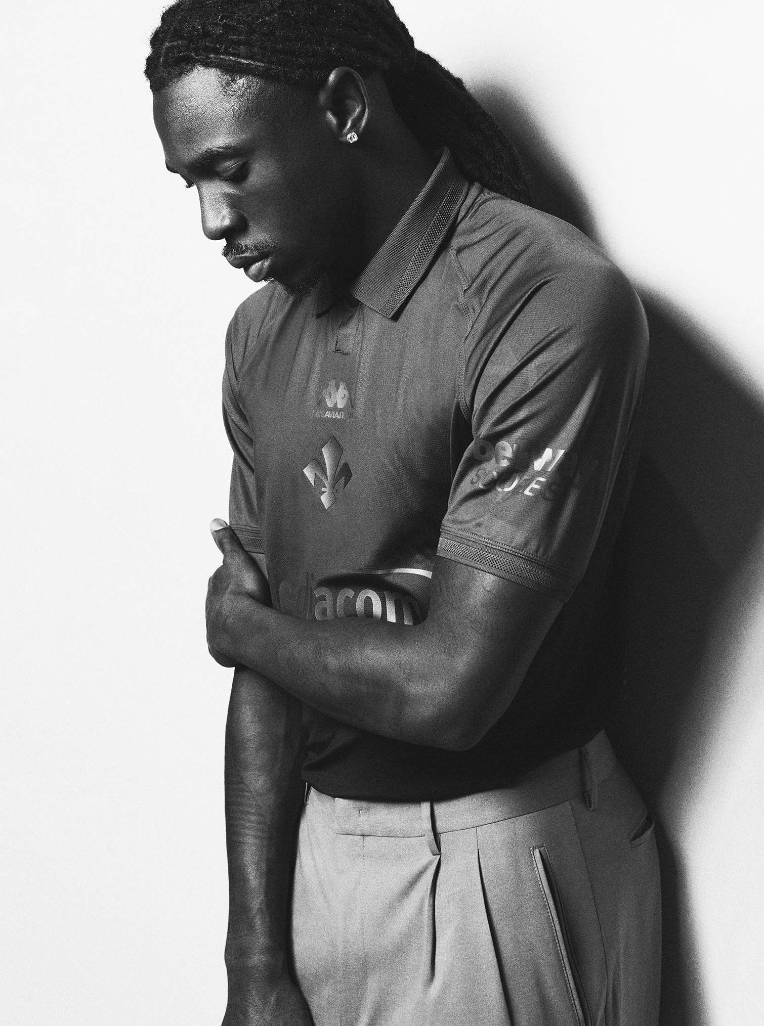 Player poses in the new fourth kit jersey