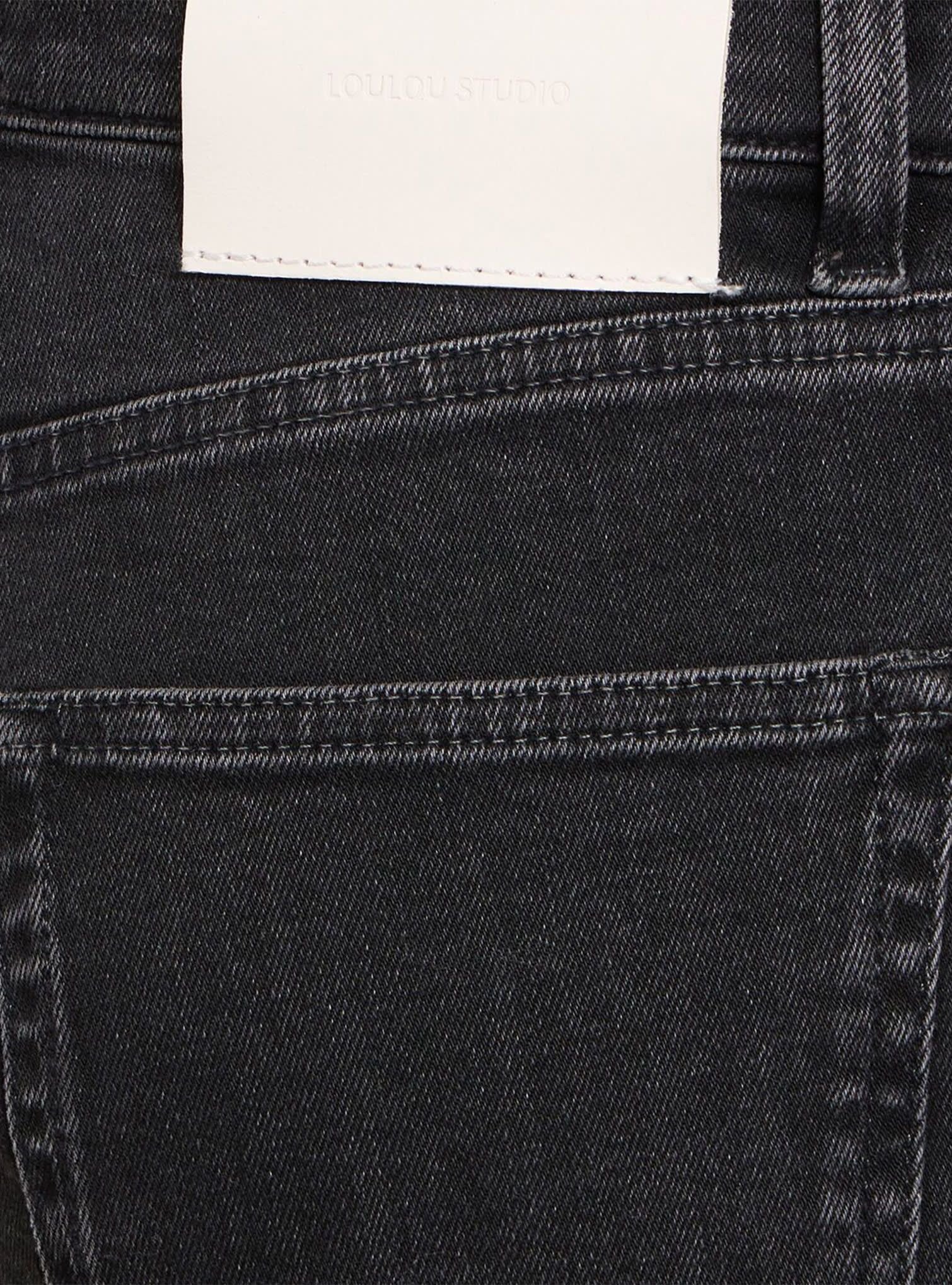 Black jeans with white label