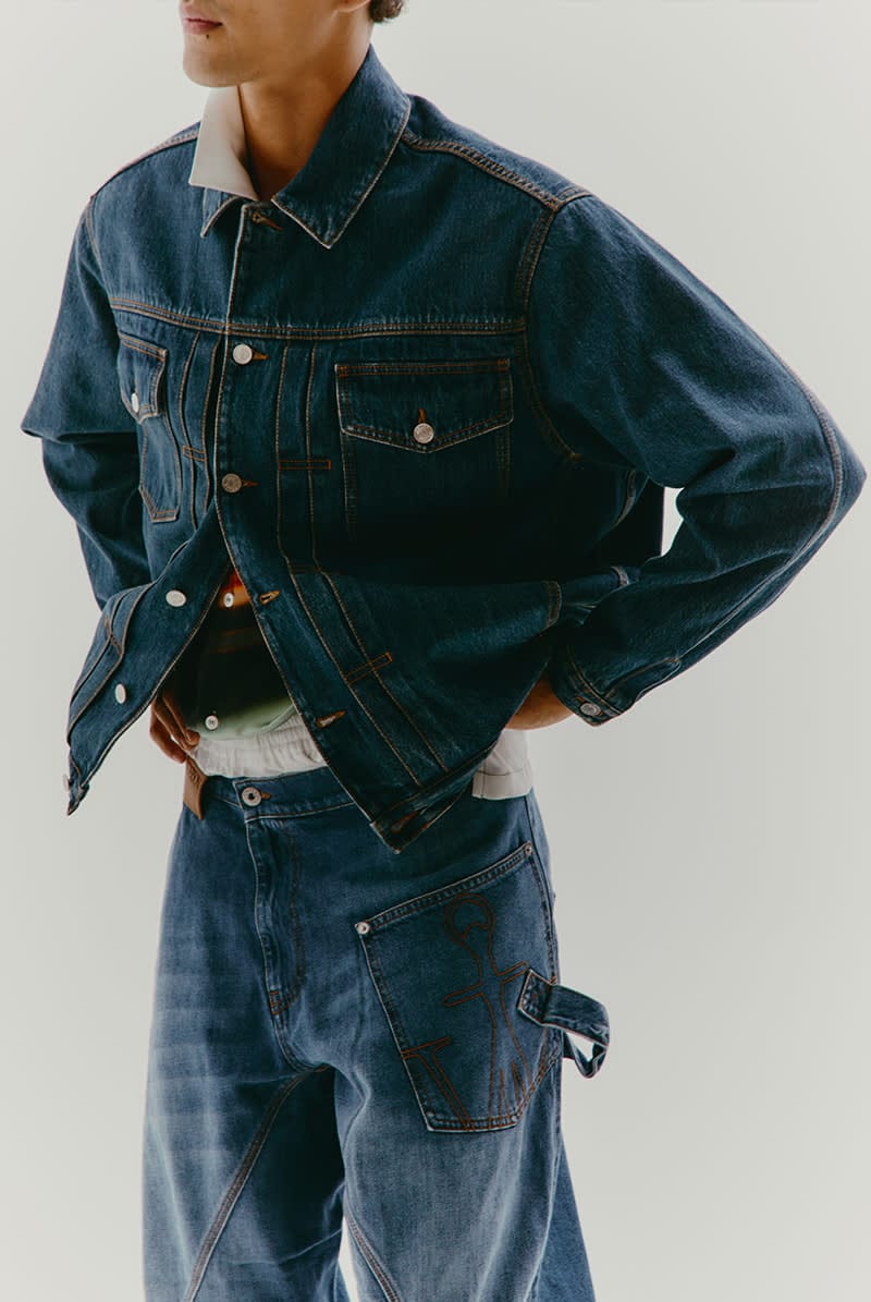 Total denim look with baggy jeans, white t-shirt, and jean jacket